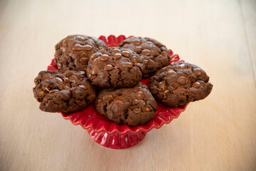 chocolate chip cookies on red plate