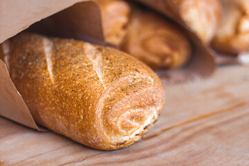 fresh baked bread on wooden table