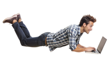 full body young man laying in the air
floating while using laptop