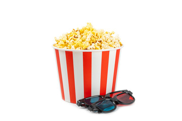 Tasty popcorn in buckets and cold cola drinks with cinema tickets, movie clapper and 3D eyeglasses isolated on white background. Cinema concept. Watching a movie.