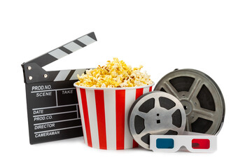 Tasty popcorn in buckets and cold cola drinks with cinema tickets, movie clapper and 3D eyeglasses...