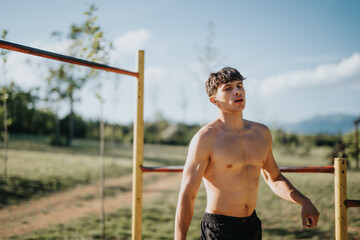 Young athletic man exercising outdoors on a sunny day in the park. Fitness and healthy lifestyle...