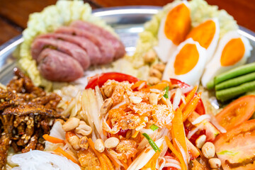 Thai food:Papaya salad on a tray