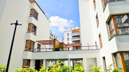 European residential architecture harmonizing with nature. Eco-friendly living in city with greens....