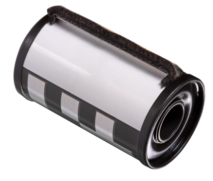 A photographic film cassette with a film speed code. Isolated background.