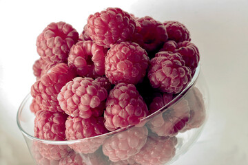 red,juicy berries of raspberry close up