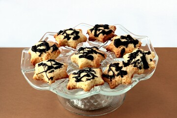 cookies coconut flakes flour and chocolate icing