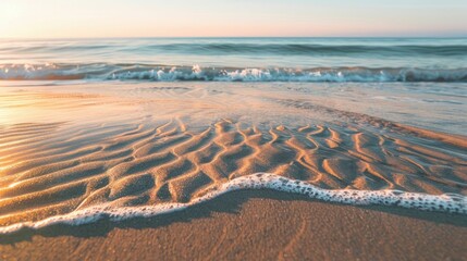 A close up of a sandy beach with waves crashing onto the shore, showcasing the beauty of natures water and wind waves in a natural landscape AIG50