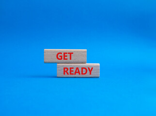 Get ready symbol. Wooden blocks with words Get ready. Beautiful blue background. Business and Get ready concept. Copy space.