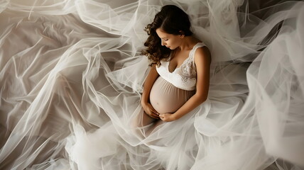 Pregnant Woman Elegant Pose Tulle Fabric Serene Maternity Beauty