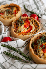 Rustic Tomato and Herb Tart with cherry tomatoes and rosemary, perfect for a veg meal