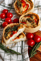 Rustic Tomato and Herb Tart with cherry tomatoes and rosemary, perfect for a veg meal