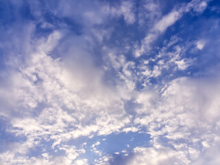 Blue sky with dramatic white clouds