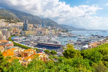  Panoramic view from the Rock of Monaco of the city of Monte Carlo, Monaco, the harbor port, mountains and city with the streets converted to race course on Grand Prix day.  © Kirk Fisher