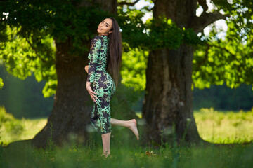 Beautiful Hispanic woman in oak forest