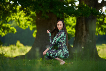 Beautiful Hispanic woman in oak forest
