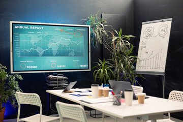 Empty boardroom office space used for corporations meetings, equipped with an interactive board. Conference room used for debates and project planning, modern enterprise.