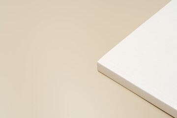 Stack of blank paper on beige background