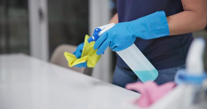 Hands, wipe and liquid for cleaning counter in home, disinfection and maid for housekeeping. Woman, maintenance service and chemical treatment to prevent germs, bacteria and disease for health safety