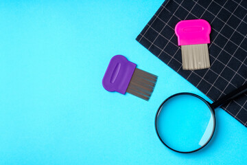 Anti lice equipment on blue background top view