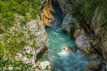 Turquoise River Flowing Through A Mountain Gorge. Soca River, Slovenia.