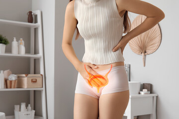 Young woman suffering from cystitis in bathroom, closeup
