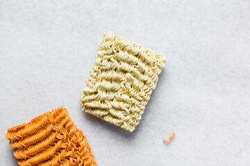 Overhead view of ramen and spicy ramen noodles, top view of noodles on countertop