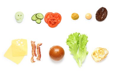 Top view of ingredients for tasty bacon burger isolated on white background