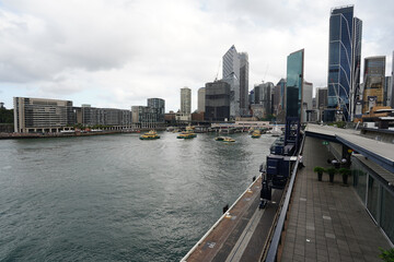 Obraz premium Circular Quay - a Sydney ferry terminal with the city skyline in the background