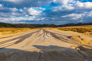 Romania, Buzău County, Berca. Geological ,botanical reservation Vulcanii Noroioși de la Paclele Mici. Small volcano-shaped structures caused by eruption of  natural gases.