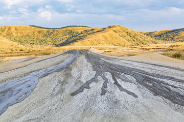 Romania, Buzău County, Berca. Geological ,botanical reservation Vulcanii Noroioși de la Paclele Mici. Small volcano-shaped structures caused by eruption of  natural gases.