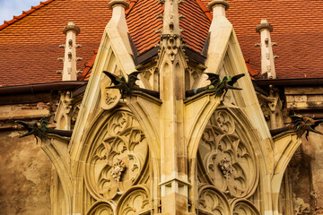 Europe, Romania, Transylvania.  Winged beast monsters as designs on castle building.
