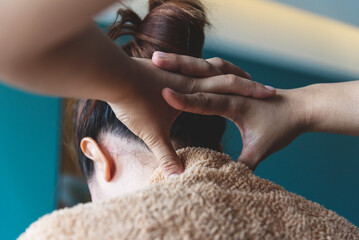 Fototapeta premium Massage Thai Spa neck shoulder arm hands massaging. Close up woman neck office syndrome therapy relax treatment spa salon. Women body tight muscle relief neck and sholder pain massage. Body therapist