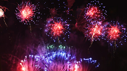 Purple Firework celebrate anniversary happy new year 2024, 4th of july holiday festival. Purple firework in night time celebrate national holiday. Violet firework Countdown to new year 2024 festival