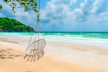 Seascape with tropical palms on beautiful Sao sandy beach in Phu Quoc island, Vietnam