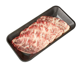 Thinly sliced ​​fresh Beef with a high layer of fat arranged on a black tray isolated on white background.