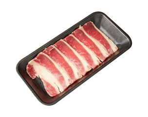 Thinly sliced ​​fresh Beef with a high layer of fat arranged on a black tray isolated on white background.