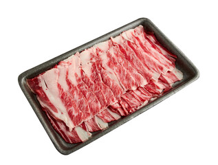 Thinly sliced ​​fresh beef arranged on a black tray isolated on white background.