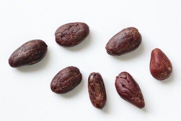 Cocoa beans isolated on white