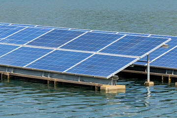 Close-up of solar panels on a floating platform in the ocean Stock Photo with copy space