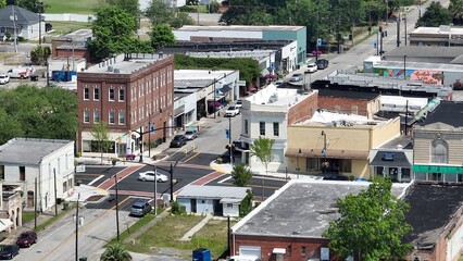 Fototapeta premium Historic Kingstree, South Carolina downtown buildings, architecture, streets, business, homes in small town USA in the South with shade trees by Black River on Sunny afternoon in summer