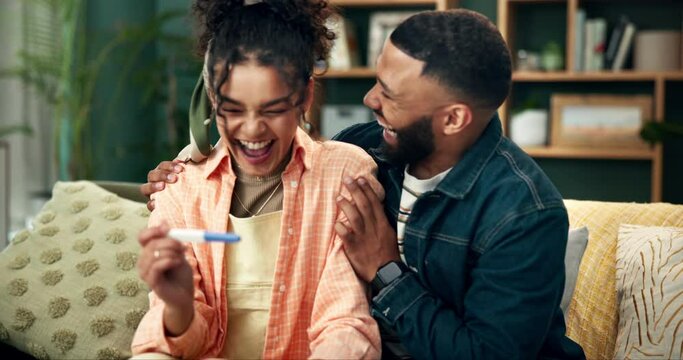Happy couple, pregnancy test and positive with surprise on sofa for motherhood, fatherhood or expecting at home. Excited man and woman with smile for pregnant results, exam or soon to be parents
