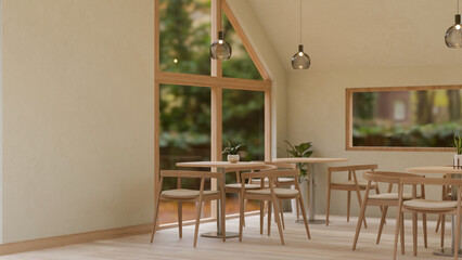 A cozy, minimalist restaurant or coffee shop seating area features wooden tables and armchairs.