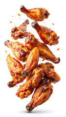 Falling Hot Barbecue chicken wings isolated on white background, selective focus, clipping path