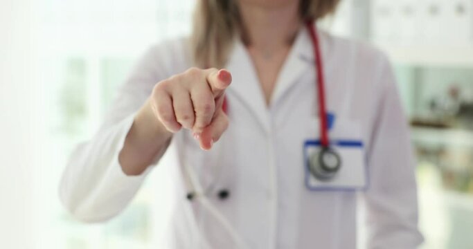 Doctor points forward reminding about regular examination
