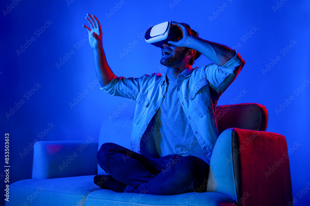 Poster man looking and touch to explore in simulated metaverse by using vr glasses. happy person with heads