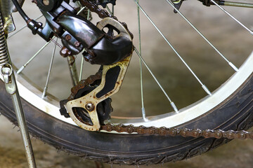 bicycle gear and chain are dirty  with oil strain . bicycle part . 