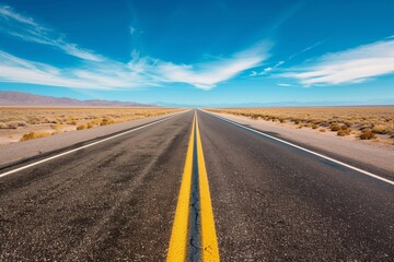 Open Road Leading to Horizon Under Clear Blue Sky
