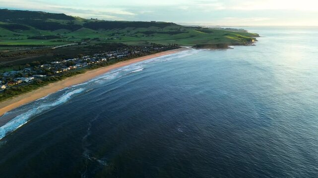 Landscape drone aerial of Werri beach main town cliff face coastline headland Gerringong coastal living Kiama South Coast Australia travel tourism