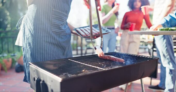 Grill, sausages and bbq dinner for party, meat and outdoor backyard cooking. Flames, food and smoke for barbecue, bonding and relax cooking with traditional American culture for Independence day